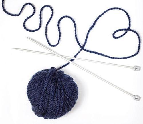 blue yard and knitting needles